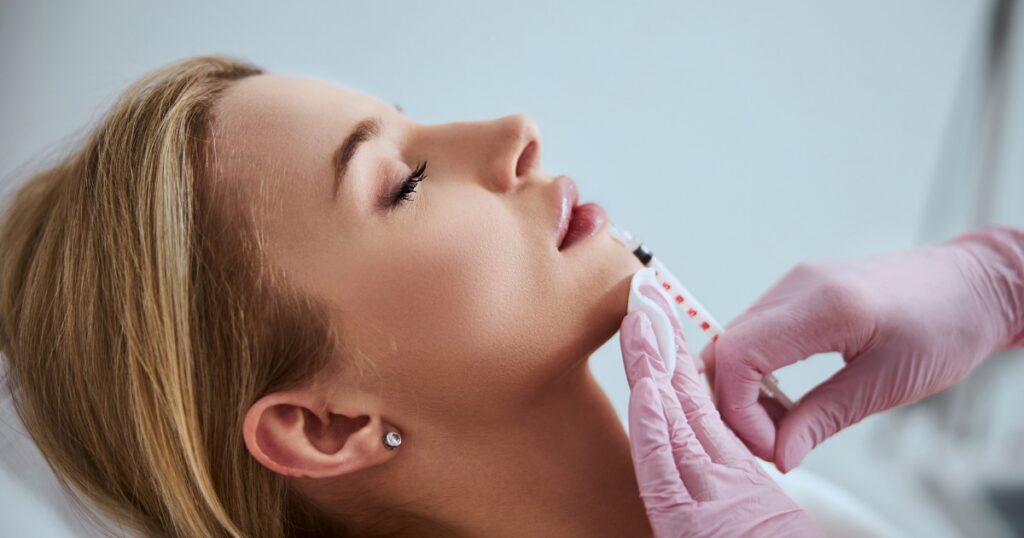 woman getting lip injections