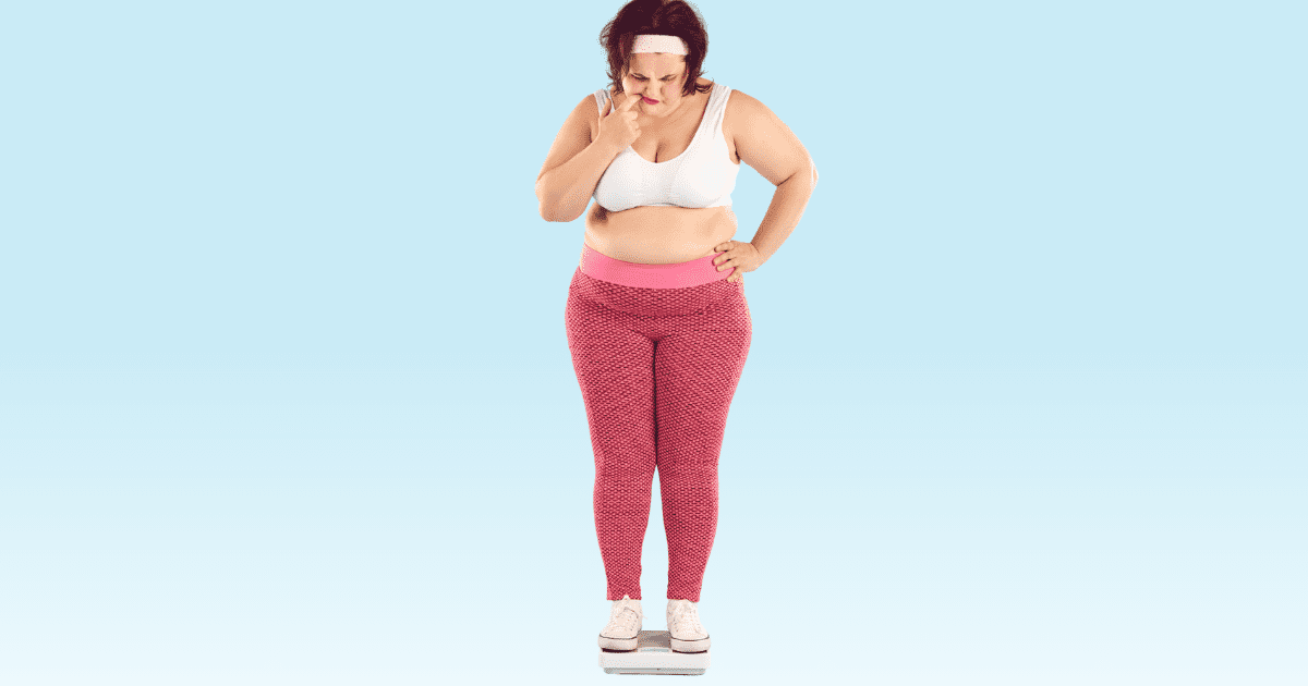 woman standing on the scale