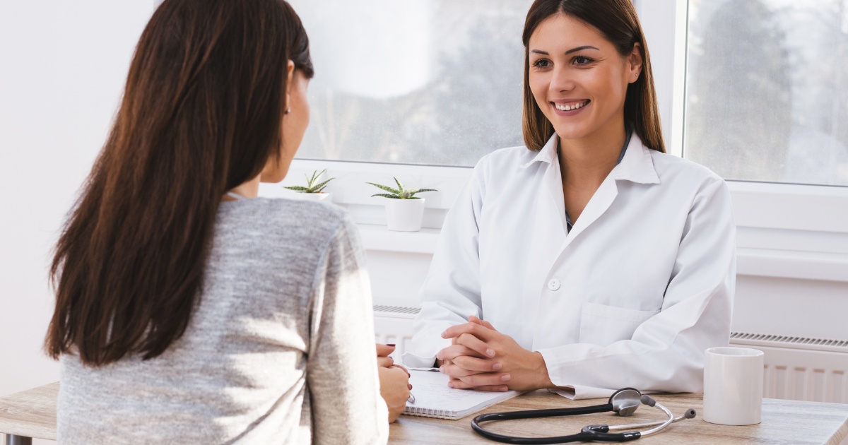 woman talking to a doctor